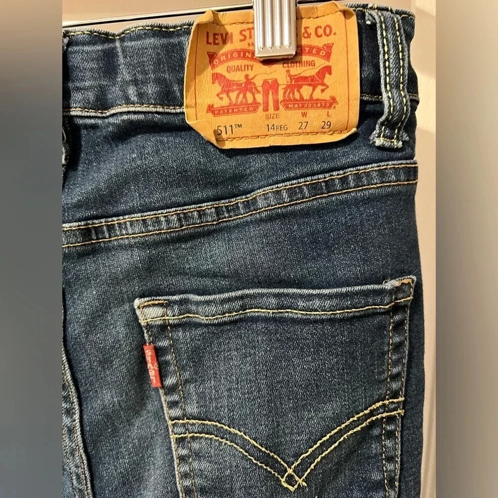 Levis 511 jeans size 14 Reg w27 x L29  with adjusters built in.